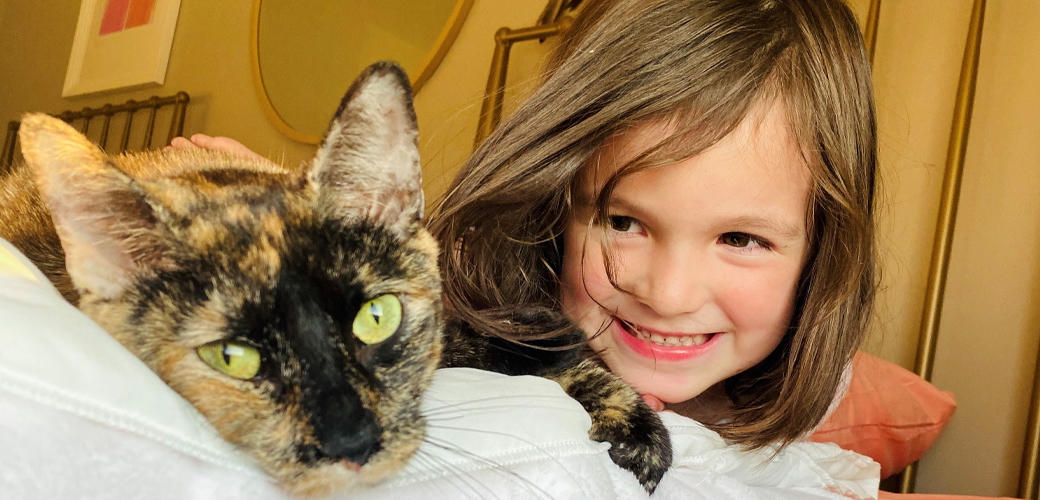 Delicata the cat with girl