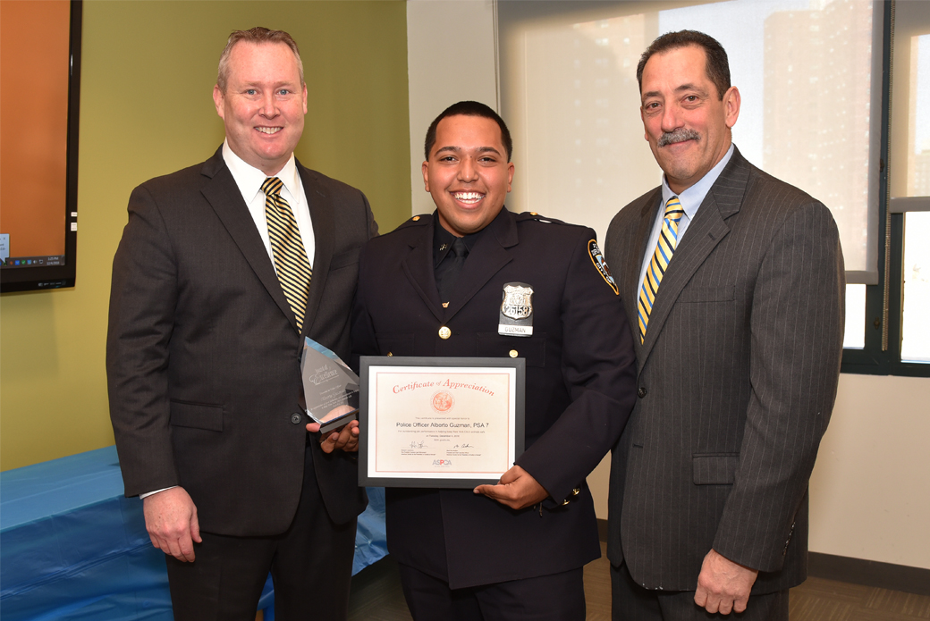 Police Officer Alberto Guzman with Howard Lawrence and Michael Mugan