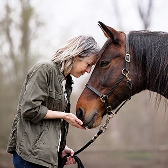 a woman and a horse