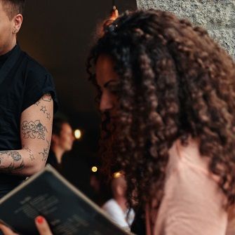 A woman reading a menu