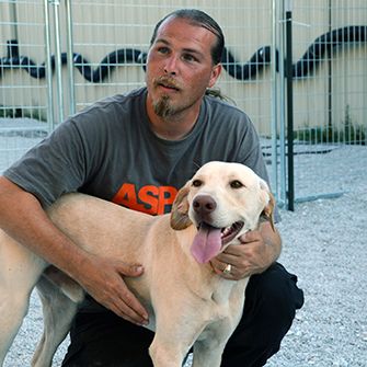 Tim Rickey and a rescued dog