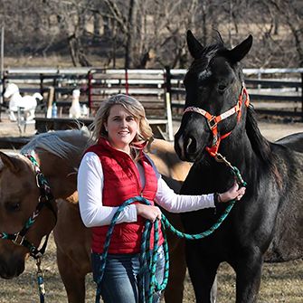 Amy with her rescued horses