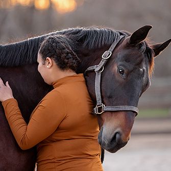 a woman with a horse