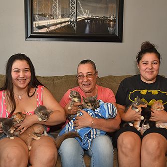 Christina, Amanda, their mother with Azalea and her kittens