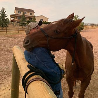 Twister resting her head on John's shoulder